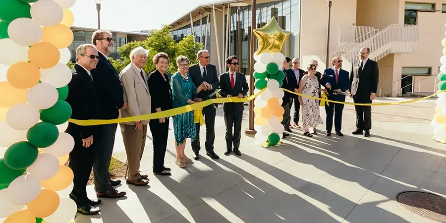 BMC Ribbon Cutting by Faculty and Friends